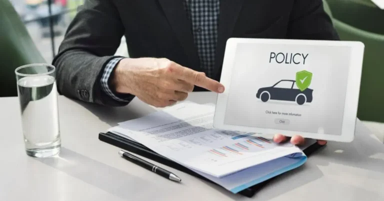 Car insurance agent helping U.S. driver choose policy